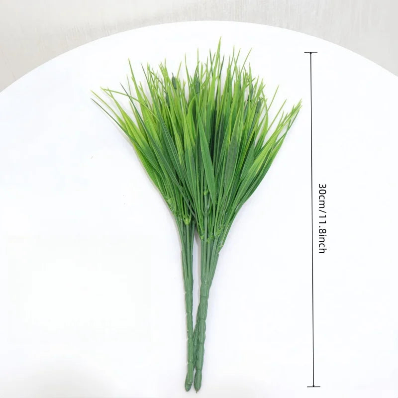 20PCS Artificial 7-Branch Plastic Grass Plants — Lifelike Green Imitation for Home, Garden & Event Decoration (30cm)